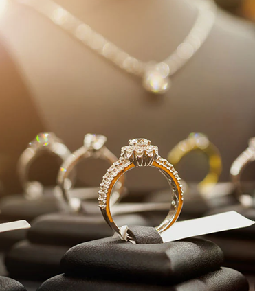 Specialized large diamond buyer evaluating a high carat engagement ring in Houston