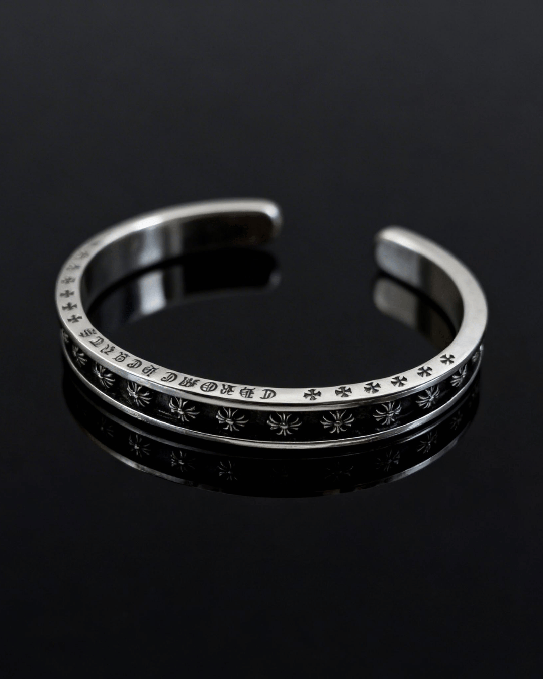 Sell Chrome Hearts in Houston: sterling silver rings and cross pendant checked at the counter